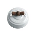 Interrupteur en porcelaine de surface modulaire, boucle en bois foncé.